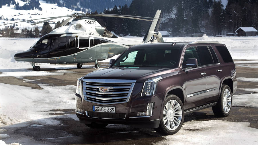 Cadillac Escalade In Snow Wallpaper
