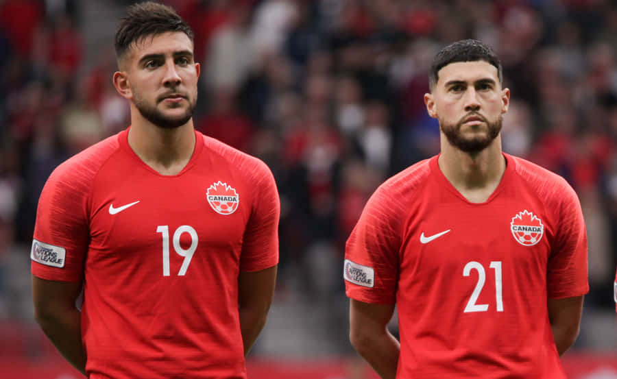 Canadian Soccer Players Cavalliniand Teammate Wallpaper
