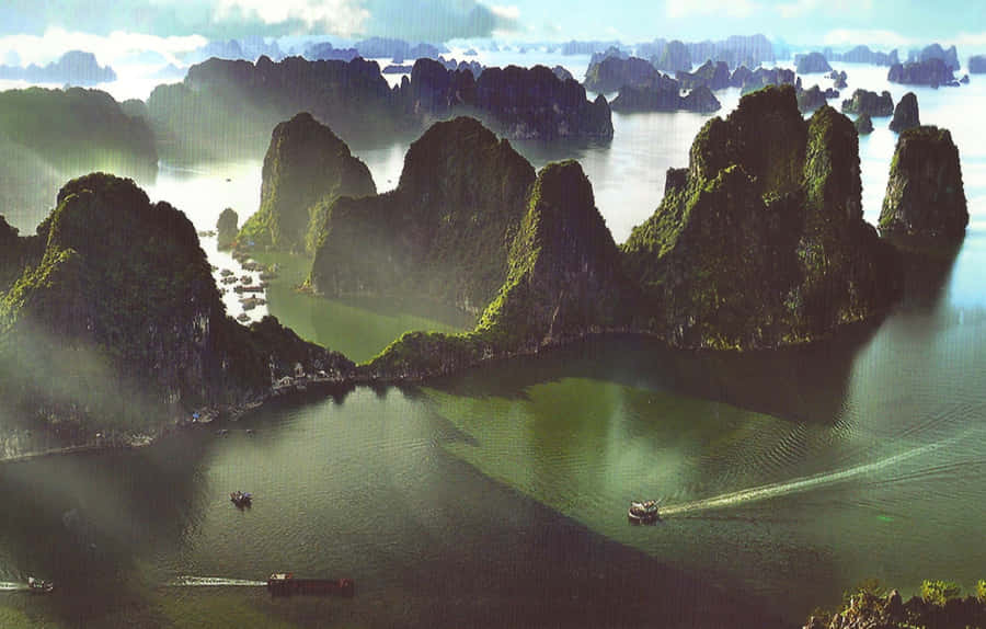 Caption: A Breathtaking View Of Halong Bay's Majestic Scenery Wallpaper