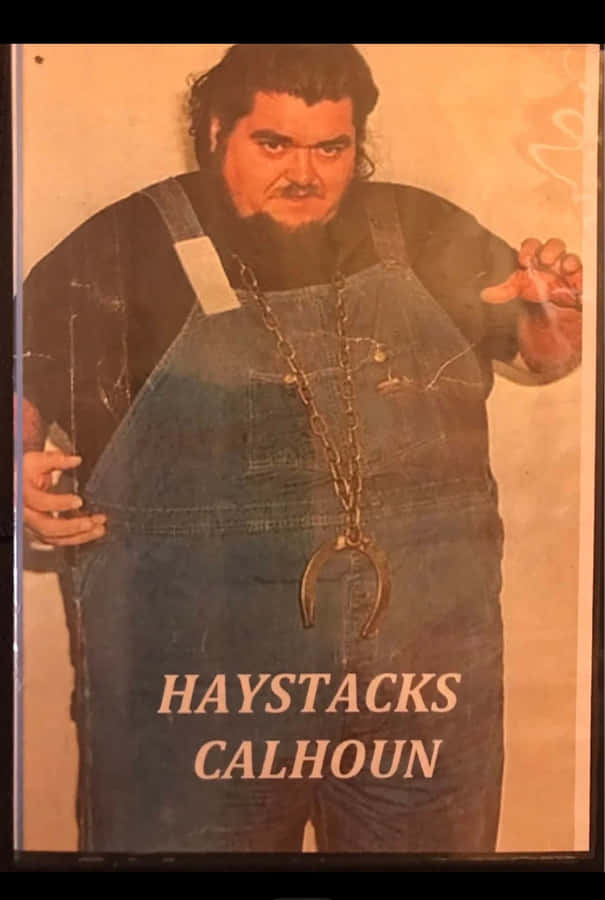 Caption: American Professional Wrestler Haystacks Calhoun In A Characteristic Sepia Portrait Wallpaper