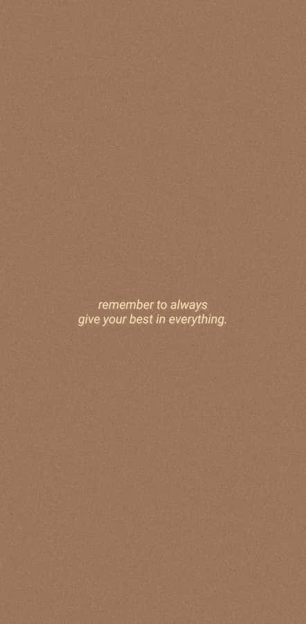 Caption: Embrace The Tranquility Of Brown Pastel Aesthetic. Wallpaper