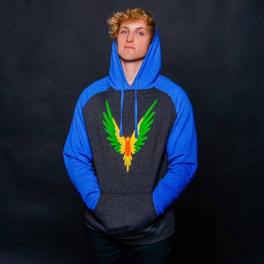 Caption: Logan Paul, A Significant Online Influencer, In A Candid Shot. Wallpaper