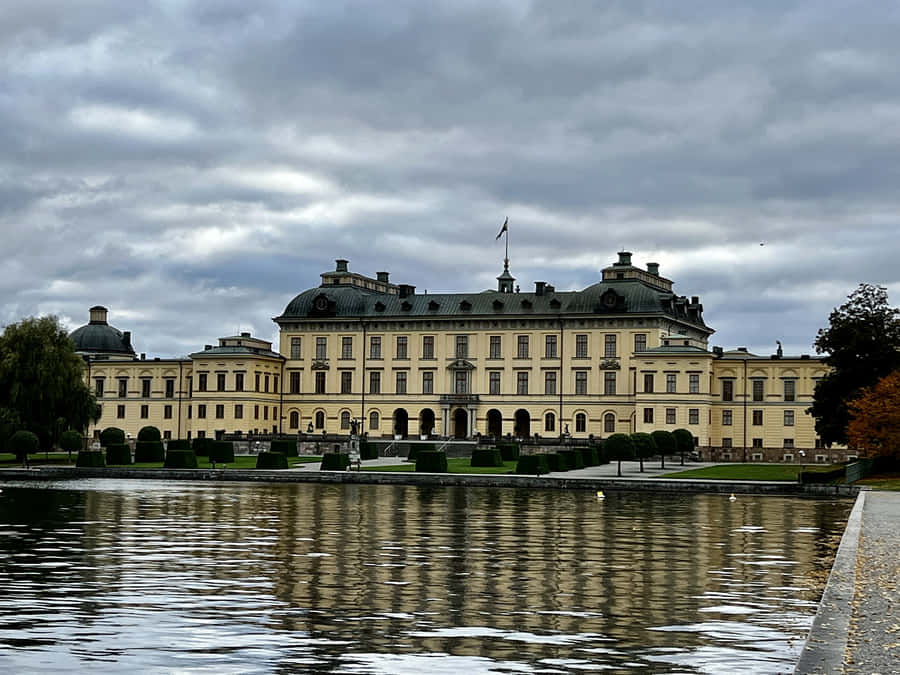 Caption: Magnificent View Of Drottningholm Palace, Sweden Wallpaper