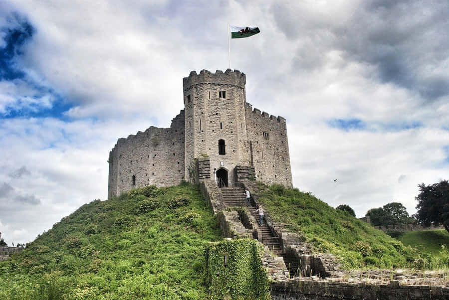 Caption: Majestic Cardiff Castle Under The Clear Sky Wallpaper