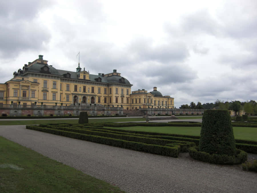 Caption: Majestic View Of Drottningholm Palace Wallpaper
