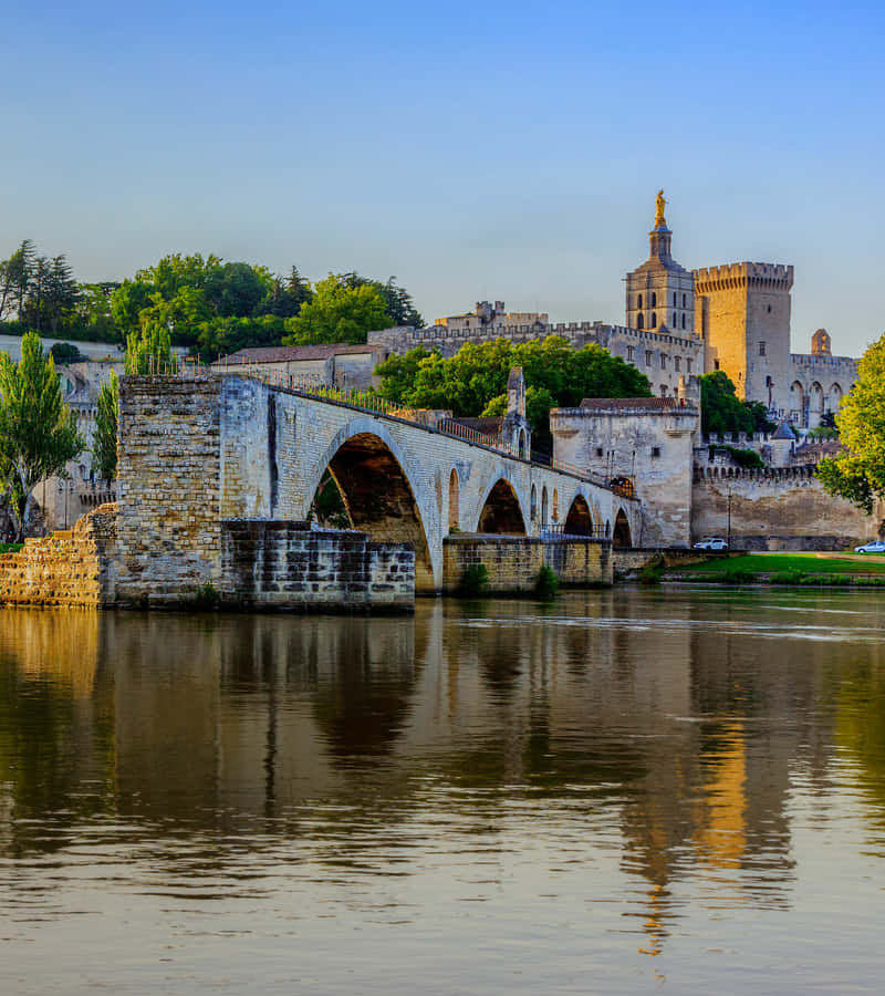 Caption: The Majestic Cityscape Of Avignon, France Wallpaper