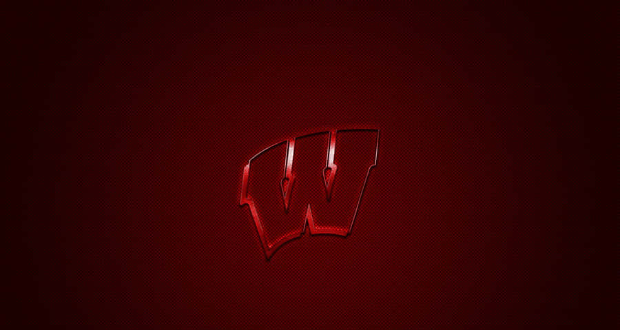 Caption: Wisconsin Badgers Football Team In Action Wallpaper