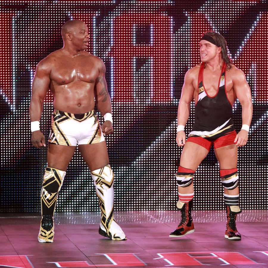 Caption: Wrestling Champions - Shelton Benjamin And Chad Gable Against The Ascension Wallpaper