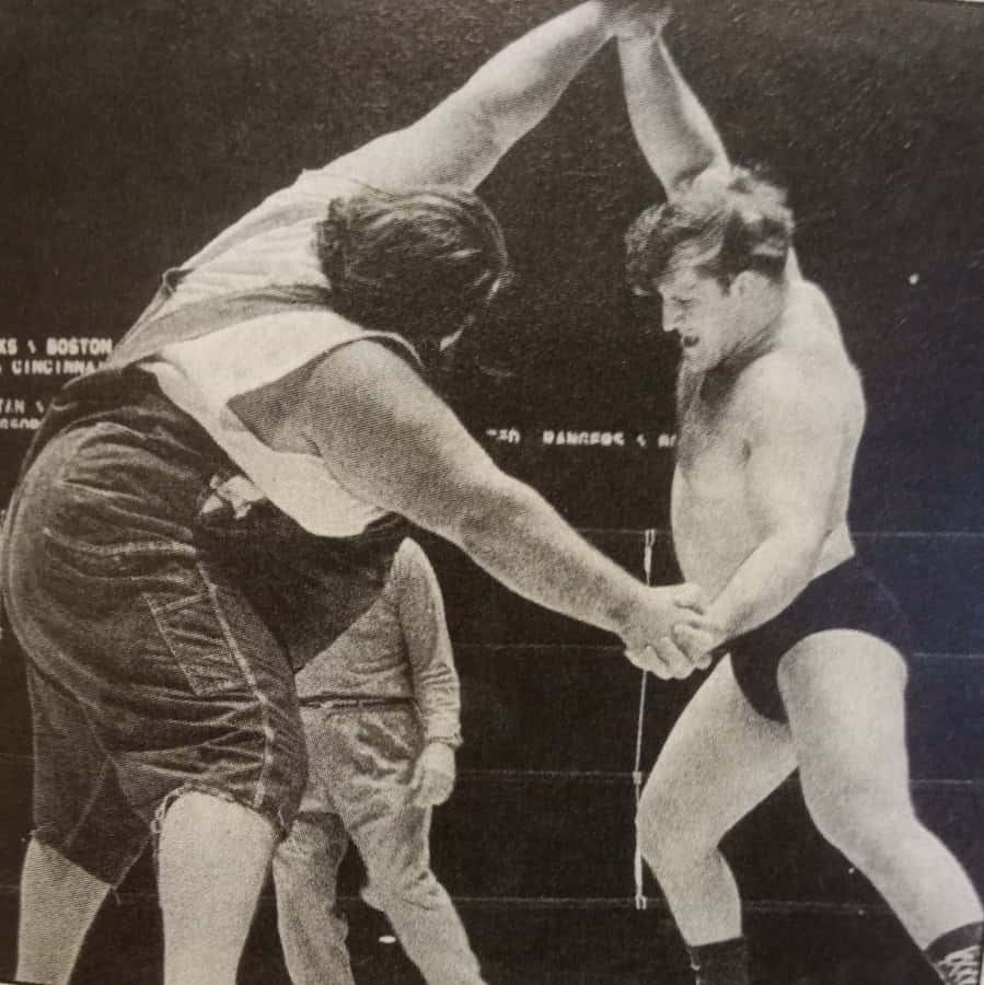 Caption: Wrestling Legends Face-off: Haystacks Calhoun Versus Sammartino Match Wallpaper