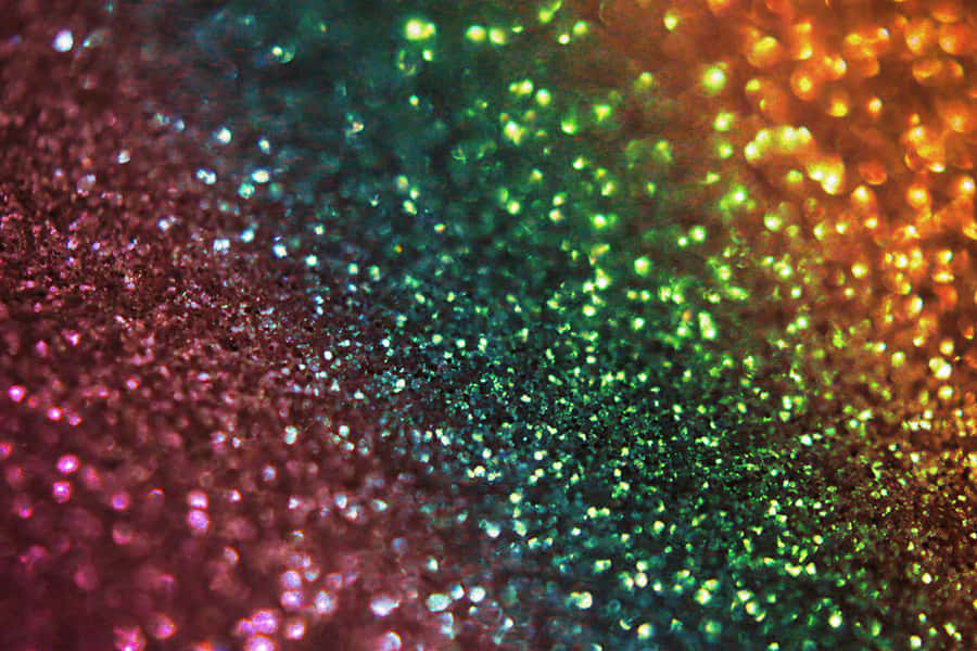Capture The Beauty Of A Rainbow In A Jar Of Sparkles Wallpaper