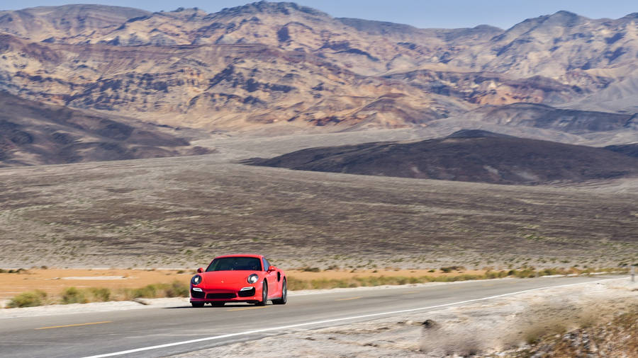 Car In Death Valley Road Wallpaper