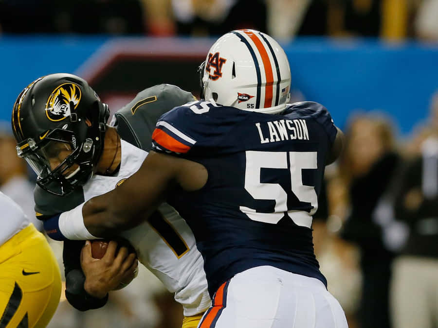 Carl Lawson Tackles Rival Wallpaper