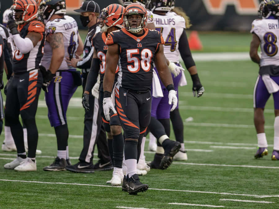 Carl Lawson With Teammates Wallpaper