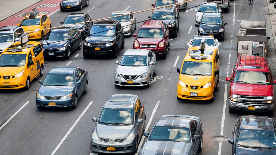 Cars And Taxi Stuck On Wide Highway Wallpaper