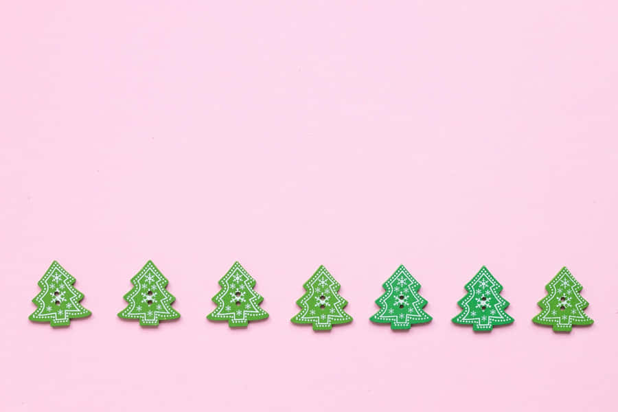 Celebrate The Holidays With A Festive Pink Christmas Tree Wallpaper
