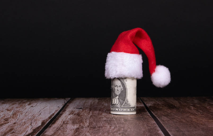 Celebrating A Merry Christmas With Money Wallpaper