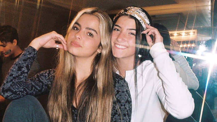 Charli And Addison Posing Together Wallpaper