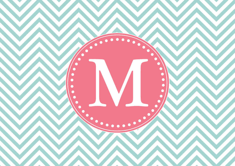 Chevron Pattern With The Letter M Wallpaper