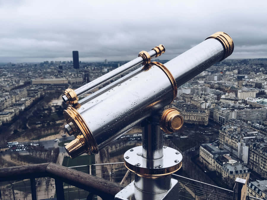 City View Telescopeona Rainy Day Wallpaper