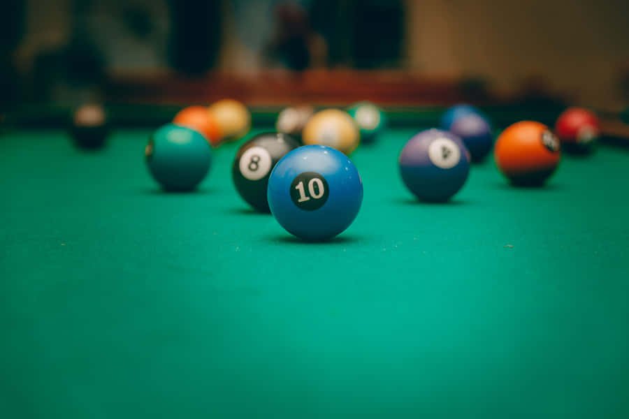 Classic Blue Pool Table With Number 10 Ball Wallpaper