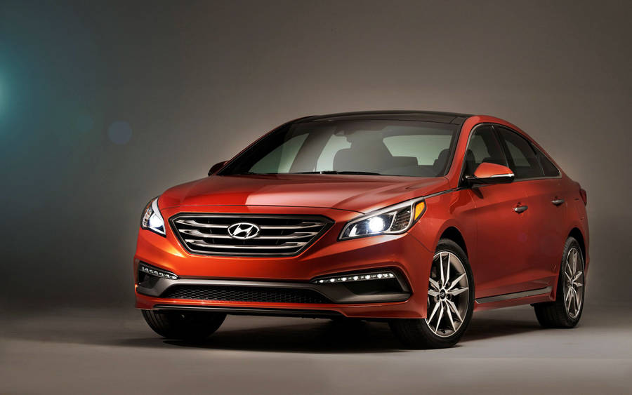 Classic Bright Orange Hyundai Sonata Wallpaper