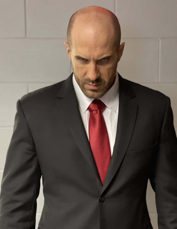 Claudio Castagnoli In Exclusive Black Suit Wallpaper