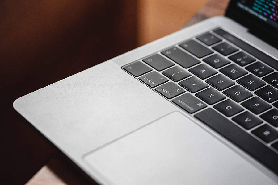 Close-up Of A Macbook Air 2020 Wallpaper