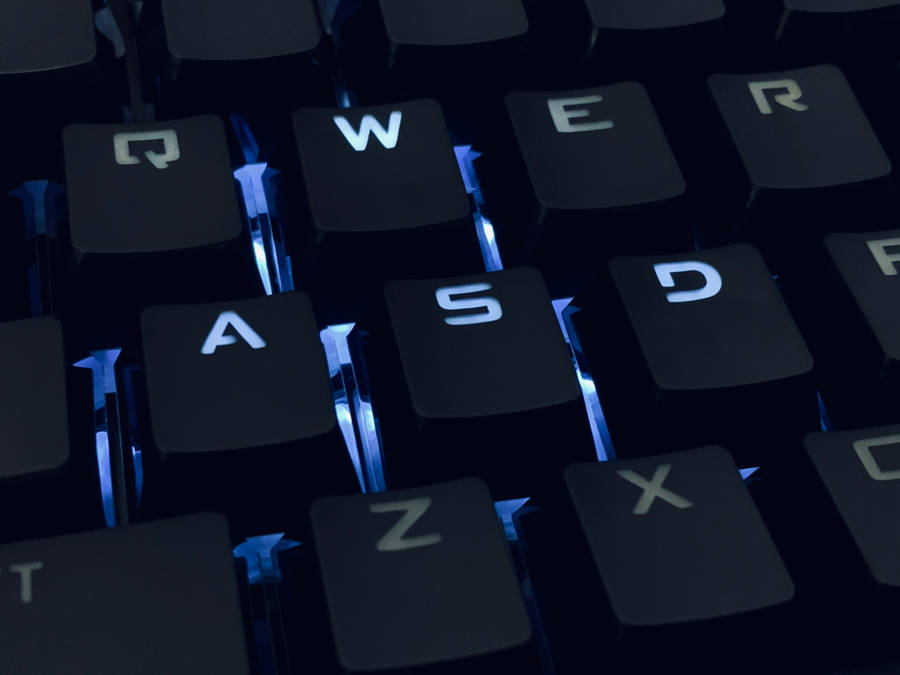 Close-up Shot Of A Gamer's Keyboard Wallpaper