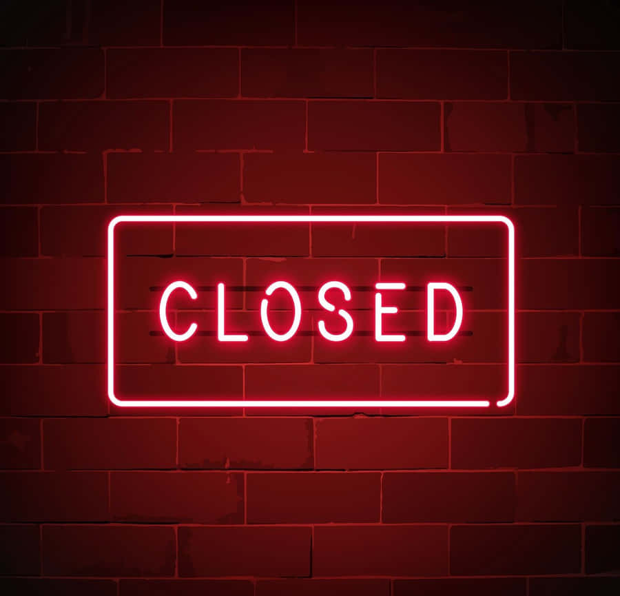 Closed Neon Sign On Brick Wall Wallpaper
