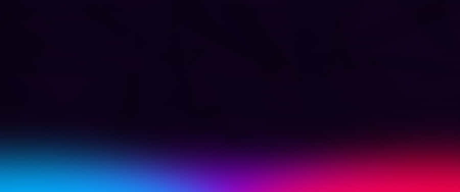 Colorful And Playful Neon Lights Reflecting Against The Wall Wallpaper