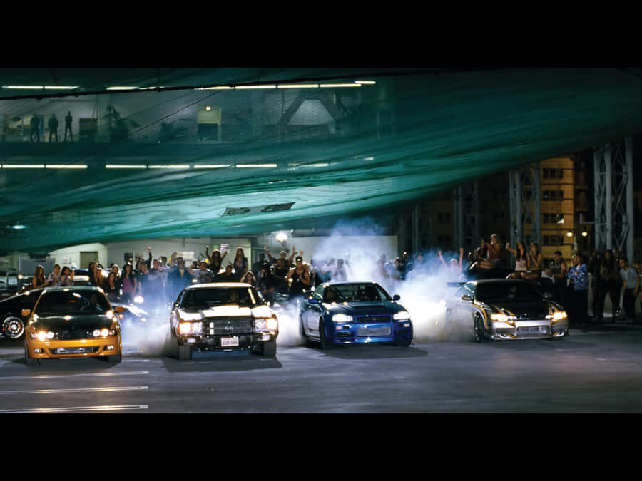 Come See Fast And Furious 1 - The Fastest Movie Of Its Time Wallpaper