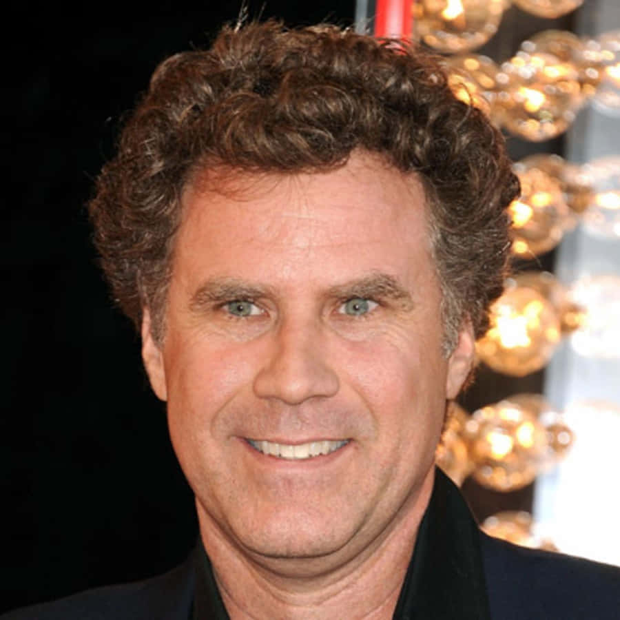 Comedic Genius Will Ferrell Smiling In A Suit And Tie Wallpaper