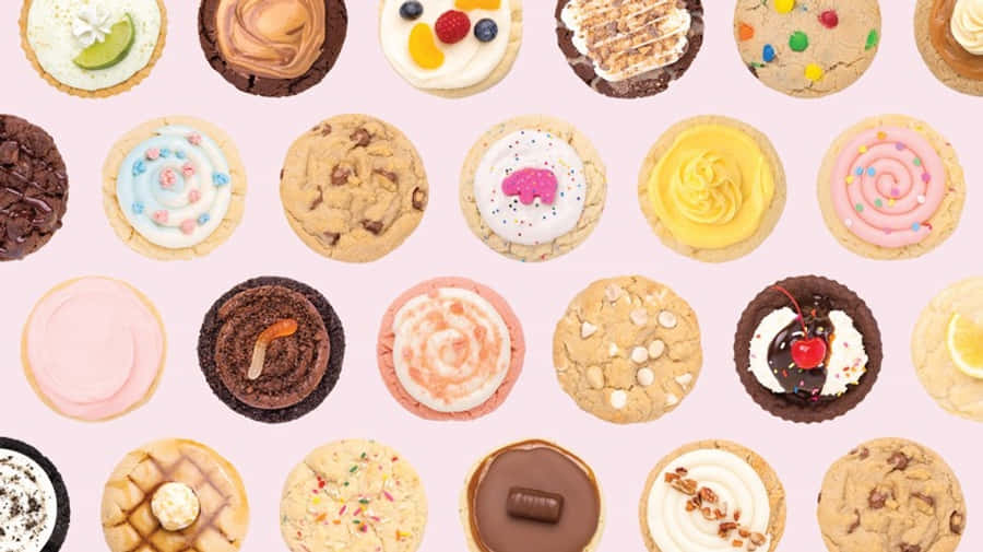 Cookies And Cupcakes On A Pink Background Wallpaper