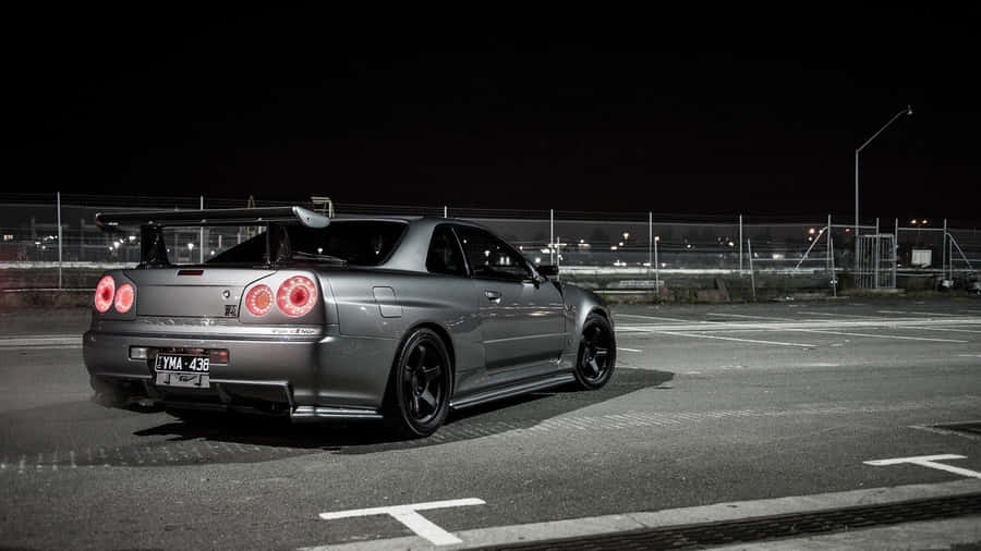 Cool Nissan Skyline Gtr In A Parking Lot Wallpaper
