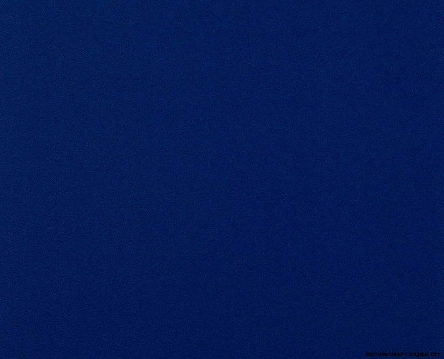 Create A Tranquil Ambiance With This Dark Blue Plain Backdrop. Wallpaper