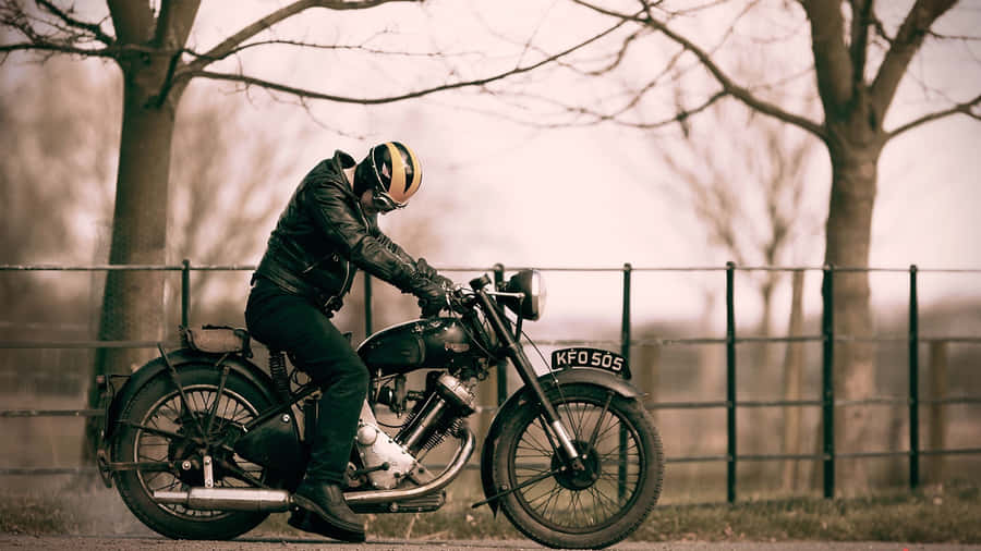 Cruising Down The Pavement On A Harley Davidson V-rod Wallpaper