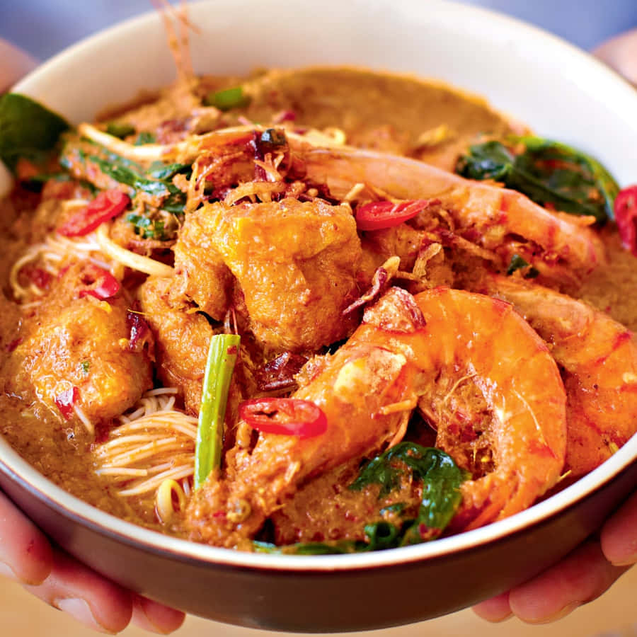 Curry Laksa On Brown And White Bowl Wallpaper