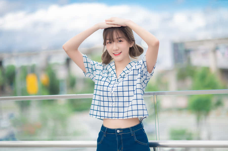 Cute Thai Girl In Printed Shirt Wallpaper