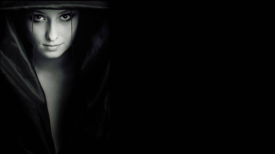 Dark Girl Girl Looking Intently Wallpaper