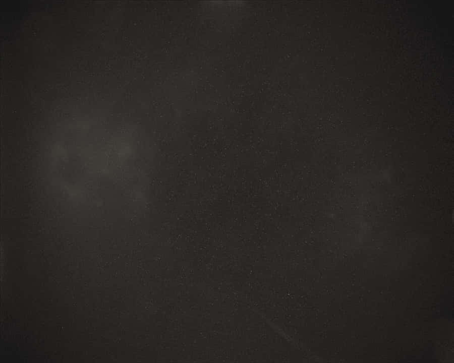 Dark Sophistication With Glossy Black Wallpaper