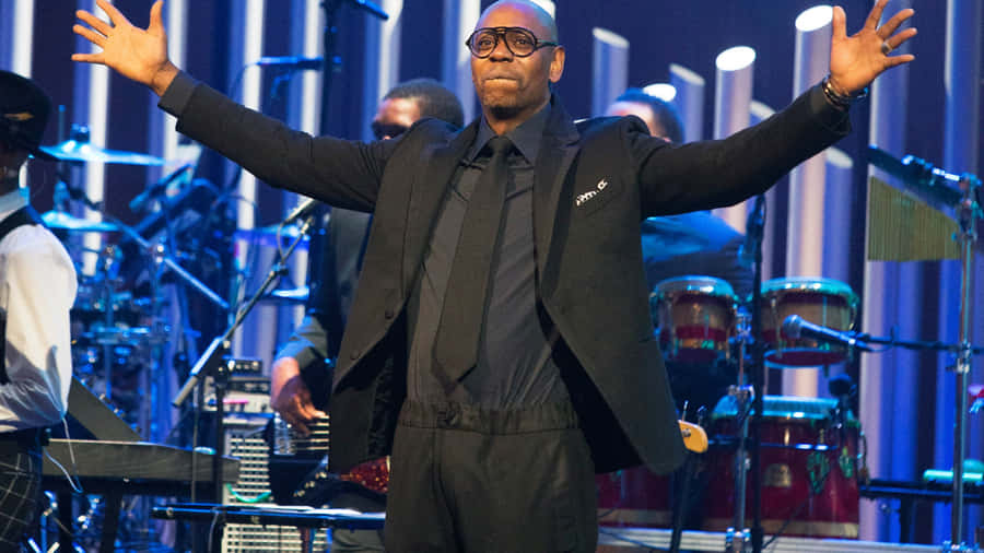 Dave Chappelle - Comedic Genius At Work Wallpaper