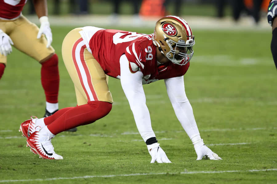 Deforest Buckner Footballer On All Fours Wallpaper