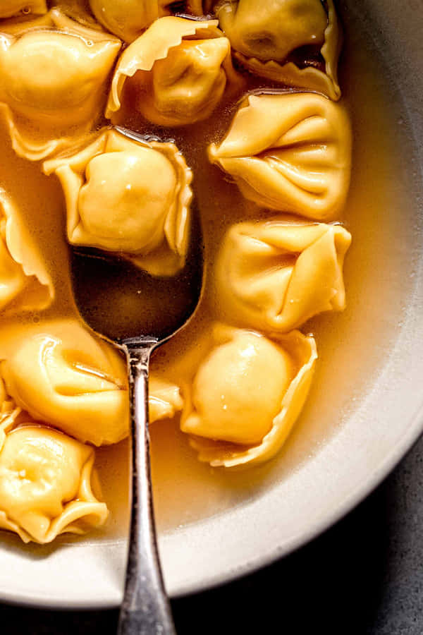 Delicate, Authentic Italian Tortellini In Brodo Soup Wallpaper