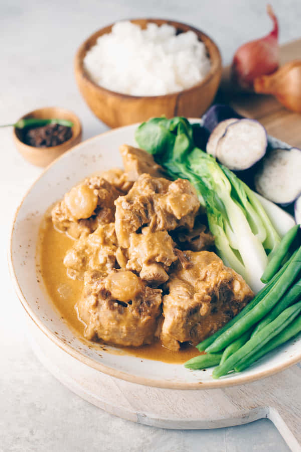Delicious Kare-kare With Rice Wallpaper