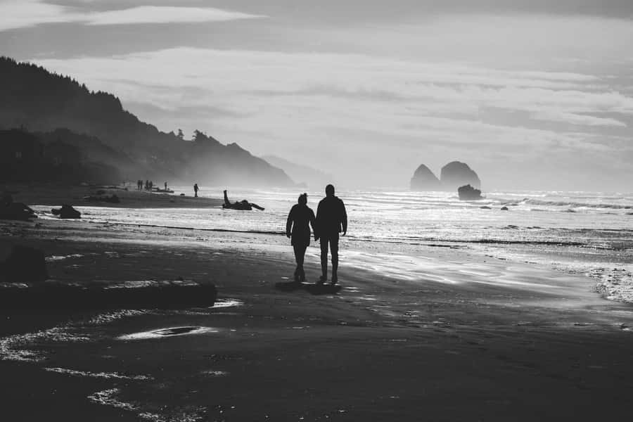 Delighted Black Couple Enjoying The Moment Wallpaper