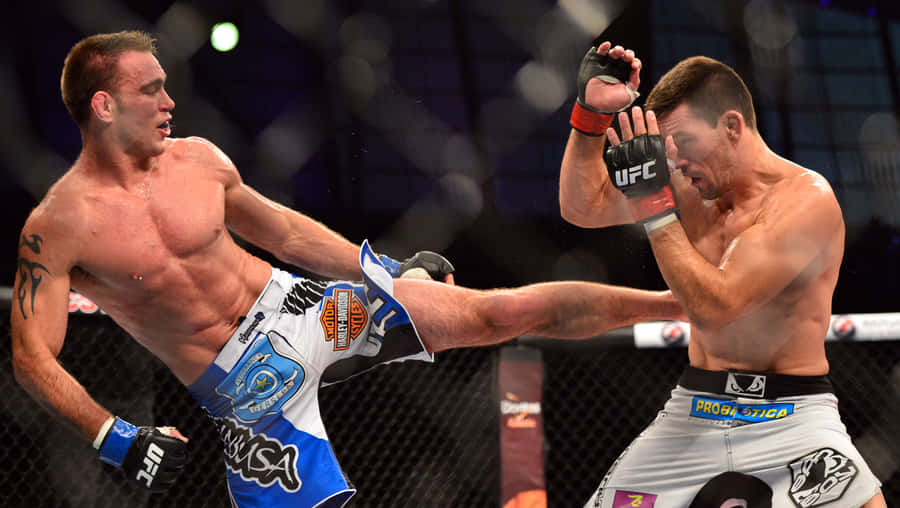 Demian Maia In A Fierce Boxing Match Against Jake Shields Wallpaper