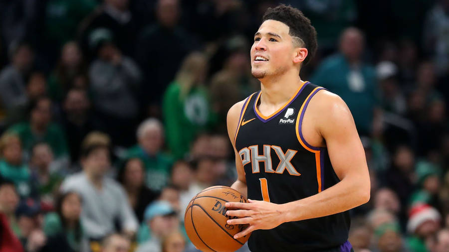 Devin Booker Holding Ball Photograph Wallpaper