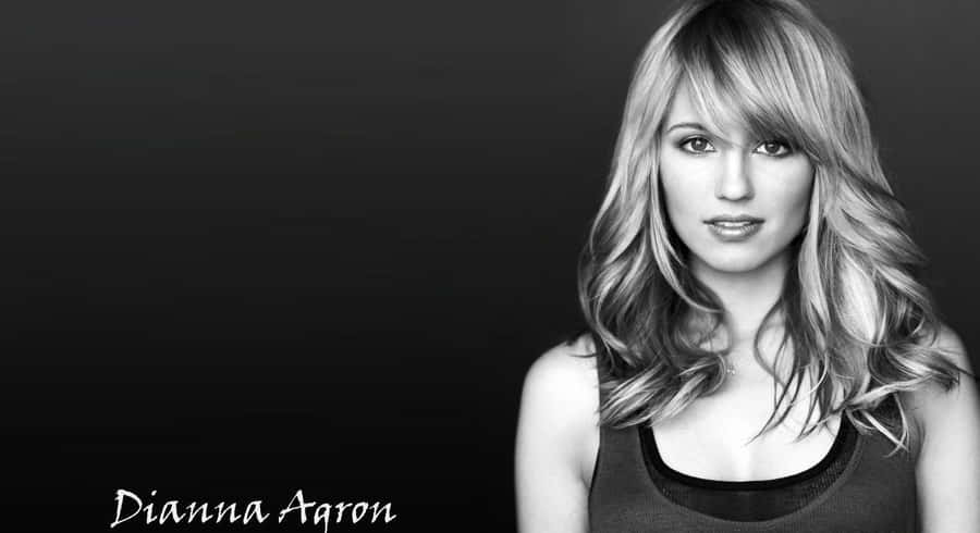 Dianna Agron Posing Elegantly In Blue Dress Wallpaper