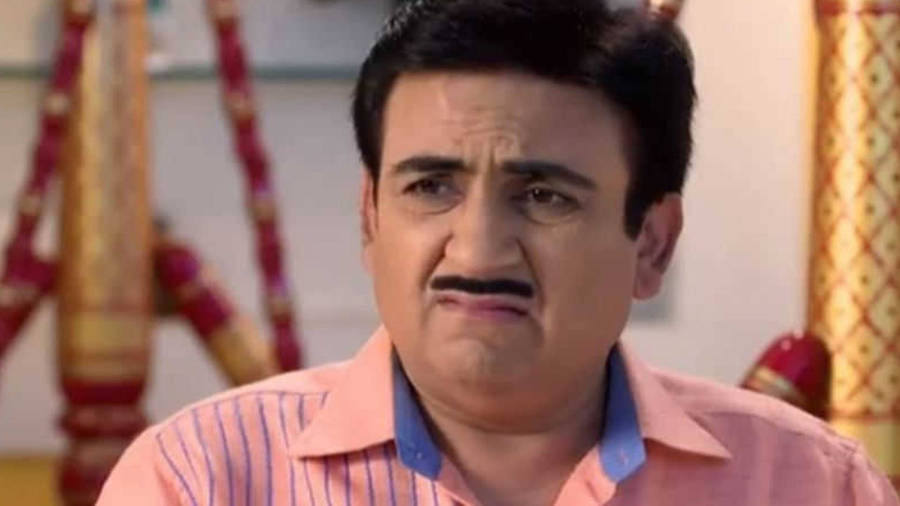 Dilip Joshi Portraying The Vibrant Character Jethalal In A Pink Polo Wallpaper
