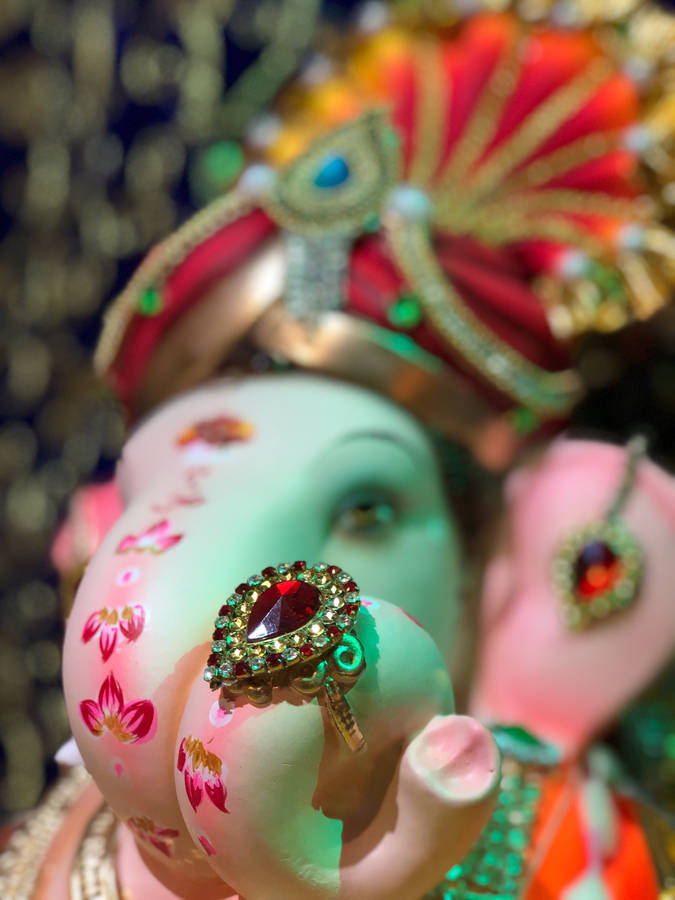 Divine Radiance Of Lord Ganesha Wallpaper